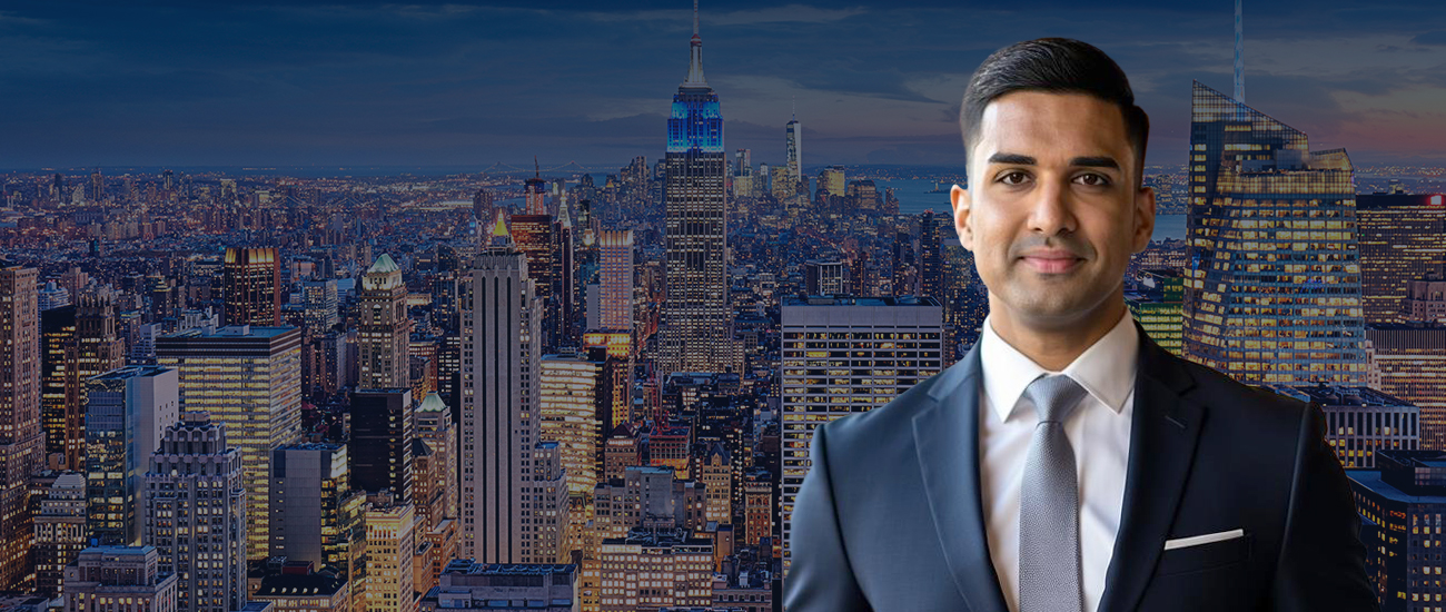 Daniel D’Costa attorney over a city skyline